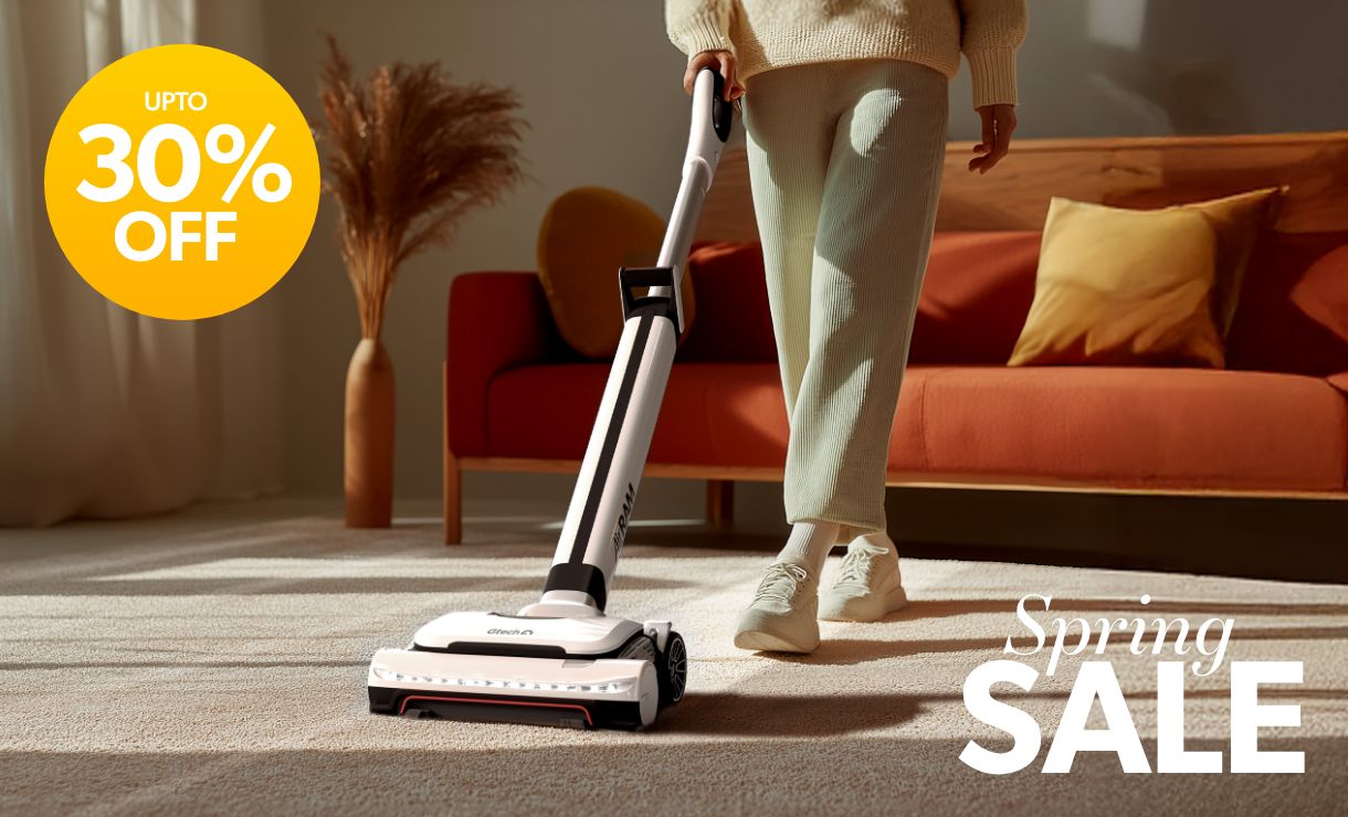 Gtech AirRAM 3 cordless vacuum cleaner standing upright on carpet in a bright, modern home interior